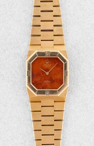 D1AH-Exceptionnelle-Rolex-Cellini-ref-4350-en-or-jaune-et-cadran-en-bois-Jamais-polie-_-Sticker-sur-le-fond-Front_f26ea7a8-2e89-4f30-967c-259dcaecd8ca