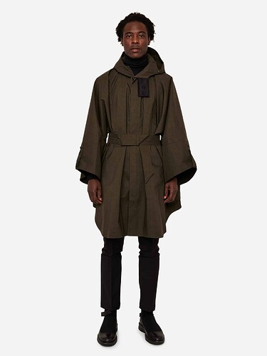 Raincho-Unisex-Mixed-Army-Green-on-him-1-scaled